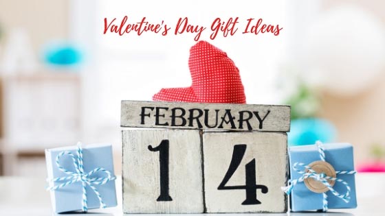 Valentine's Day Gift Ideas heading and below it is a heart shape cushion on top of a February 14 calendar with two mini gift boxes beside it